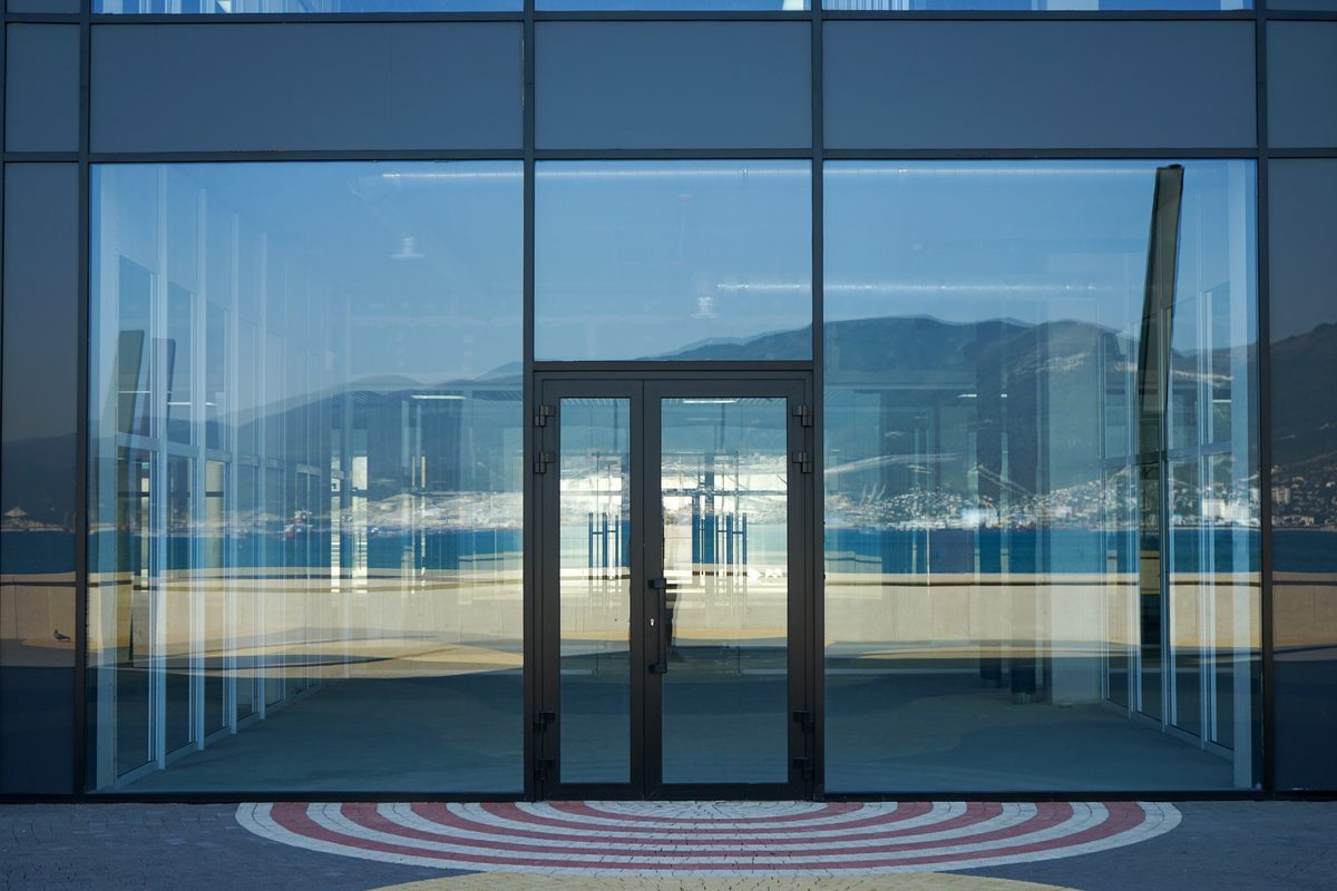 Aluminum framed storefront glass wall with double entry doors