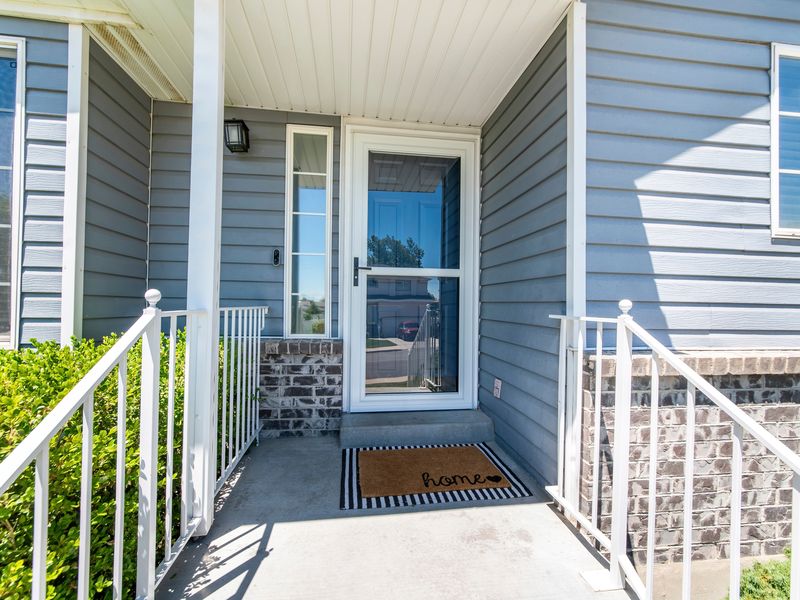 Full view glass storm door on a residential front entry