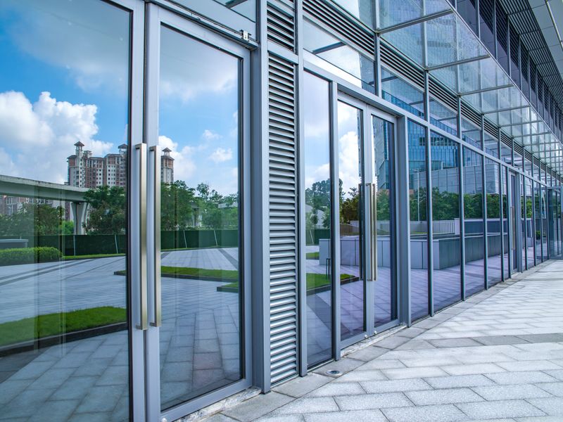 Aluminum framed commercial entrance doors and glass curtain wall